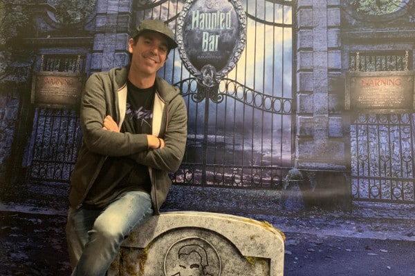 Man sitting on tombstone